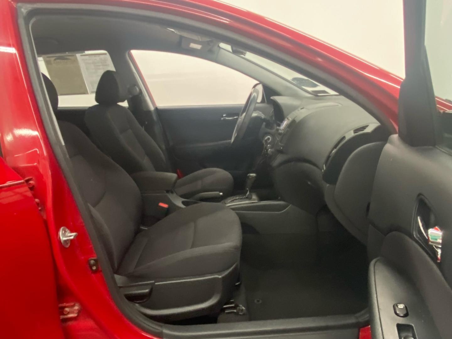 2012 RED /Gray Hyundai Elantra Touring SE Manual (KMHDC8AE5CU) with an 2.0L L4 DOHC 16V engine, 5-Speed Automatic transmission, located at 533 S West End Blvd., Quakertown, PA, 18951, (877) 257-4995, 40.343994, -75.303604 - INCLUDED IN THE SALE PRICE OF EVERY VEHICLE: 48 Hour Money Back Guarantee 6 Month - 6,000 Mile Warranty Brand New PA State Inspection & Emission $10 Oil Changes for the Life of the Loan Complete CARFAX - Photo#5